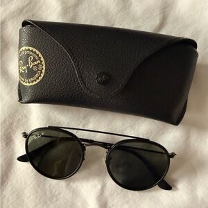 Ray-Ban Round Polarized Black Leather Case included. No scratches or flaws.